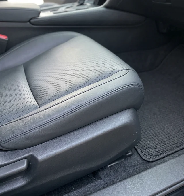 Same car interior leather seat and vacuumed floor mat spotless after cleaning